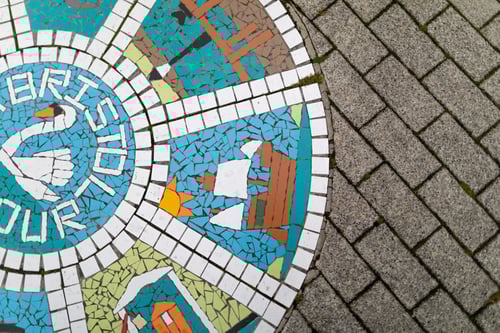 Floor tiles arranged into a boat pattern